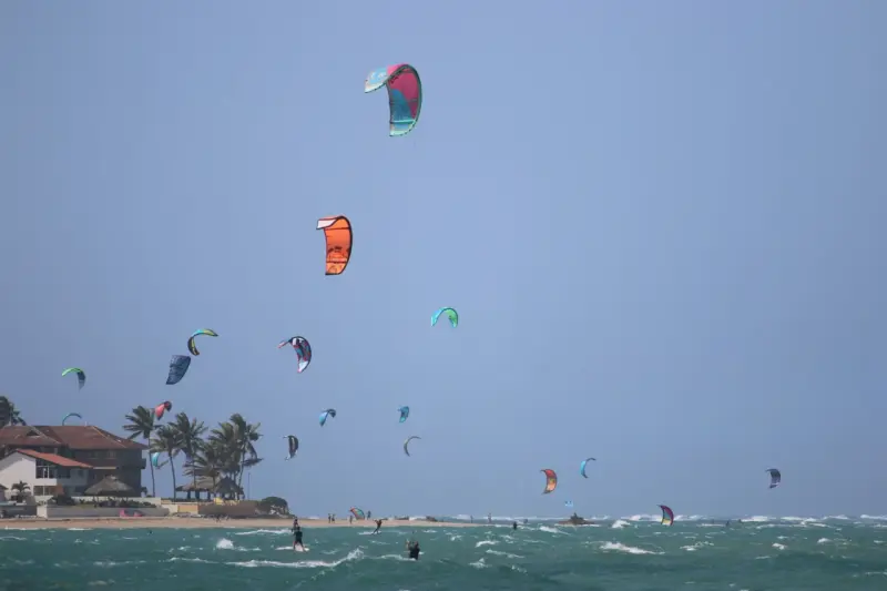 Kitesurfers on the beach of Cabarete on the North Coast of the Dominican Republic